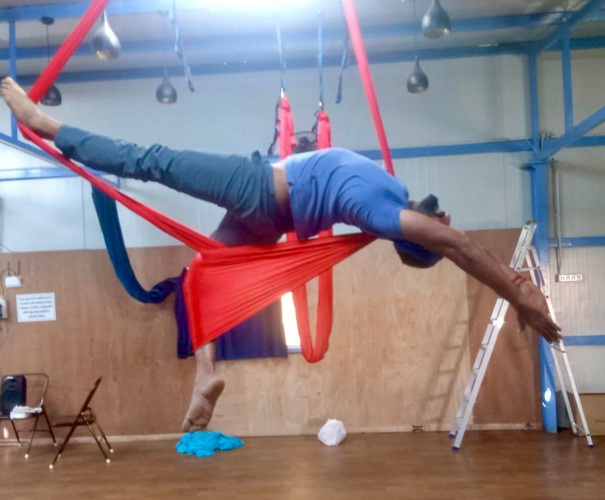 Opening the spine in the air