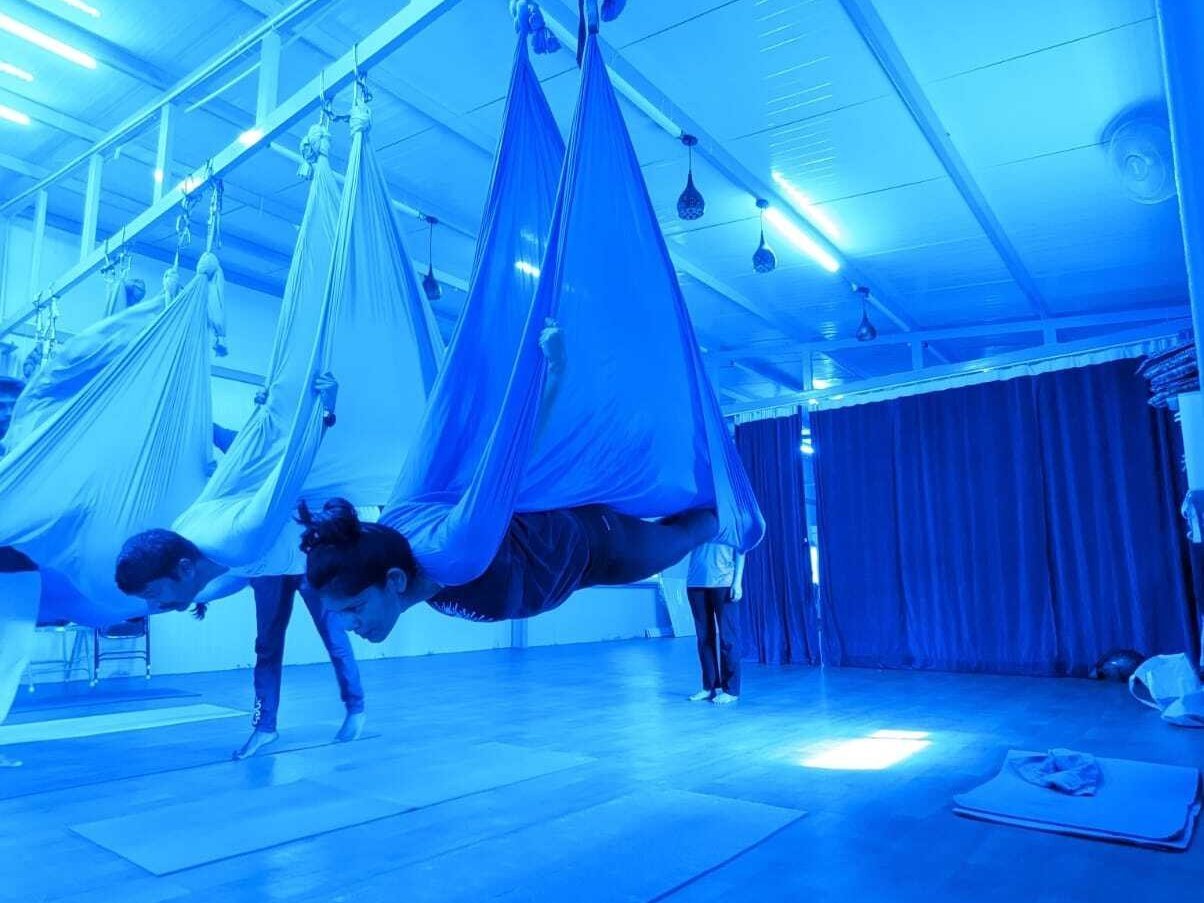 Inversions and arm balances on the hammock